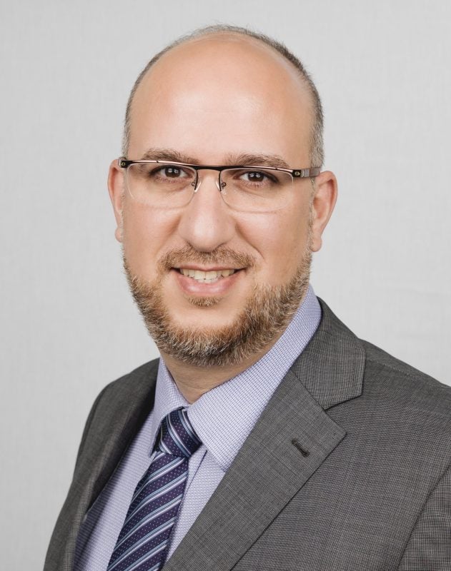Portrait of Dr. Ballo in professional business attire