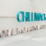 Close-up of raised metallic lettering displaying 